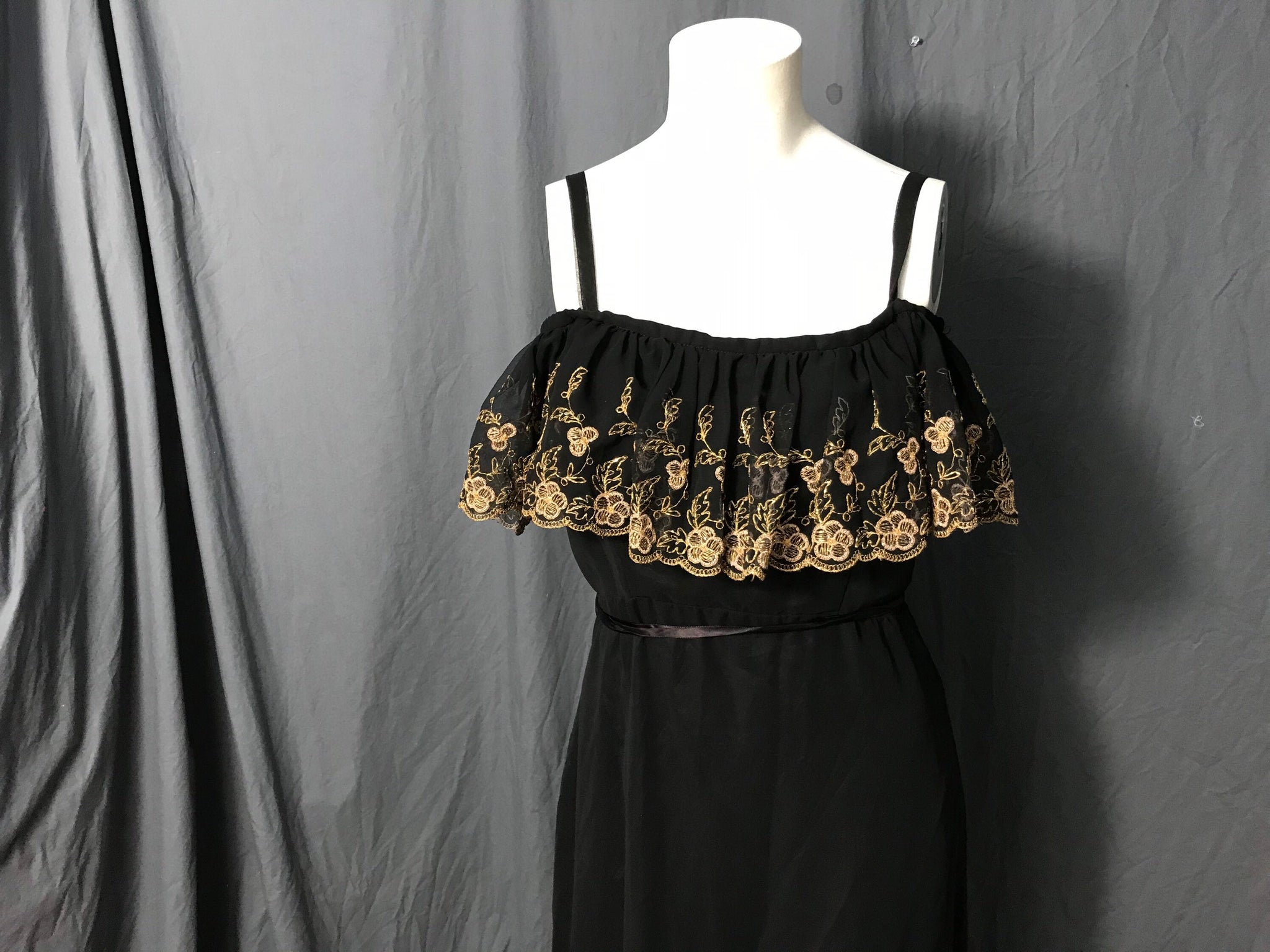 Vintage black and gold long 1970’s ruffle bust dress M