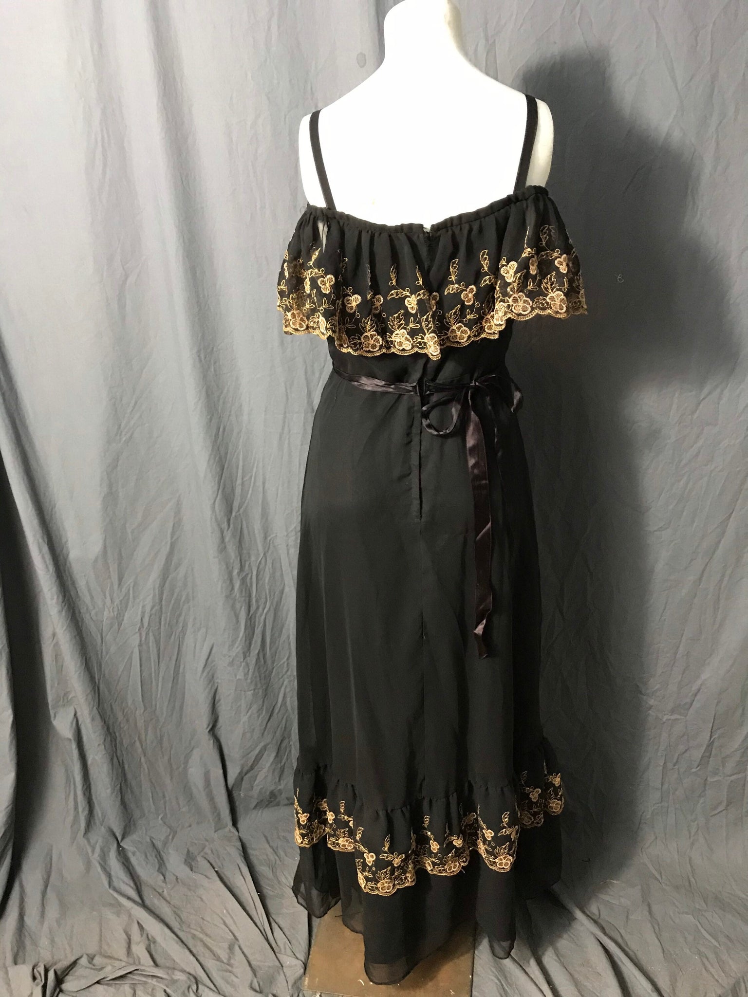 Vintage black and gold long 1970’s ruffle bust dress M