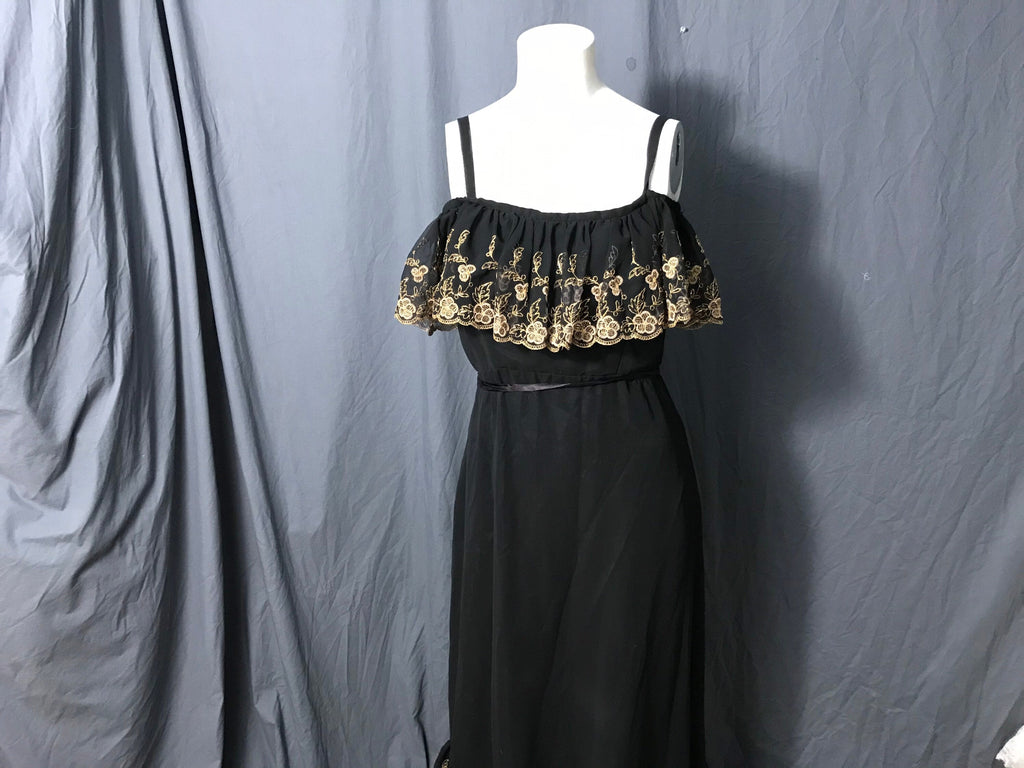 Vintage black and gold long 1970’s ruffle bust dress M