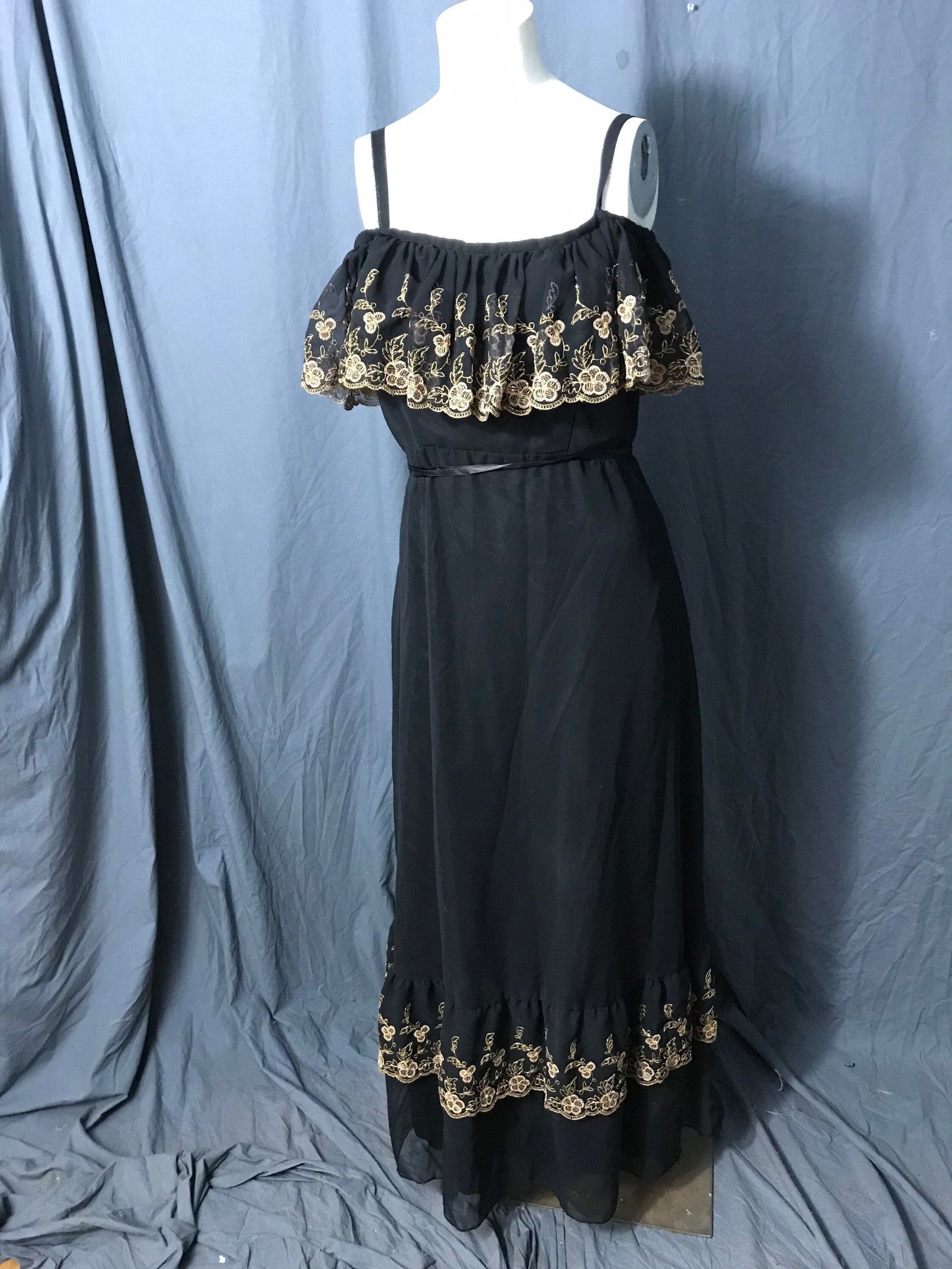 Vintage black and gold long 1970’s ruffle bust dress M