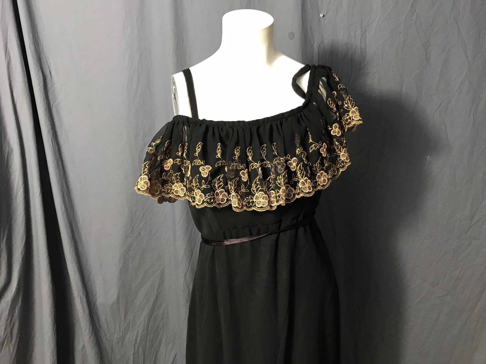 Vintage black and gold long 1970’s ruffle bust dress M