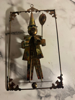 Vintage metal clown wall art