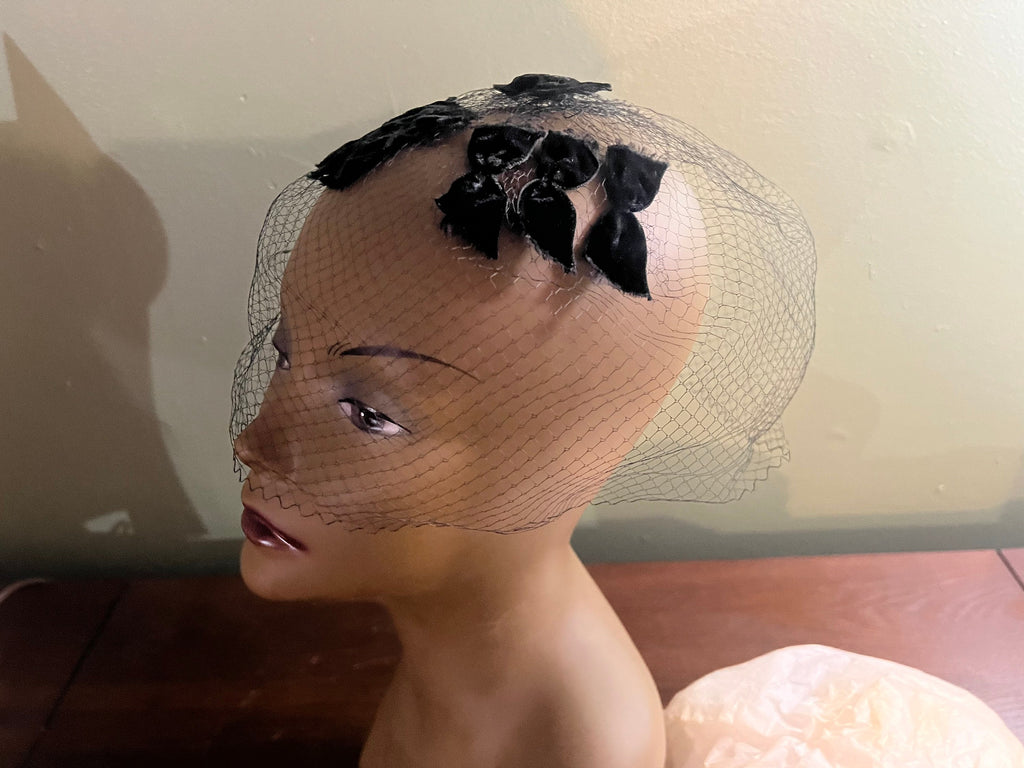 Vintage black net hat with small bows