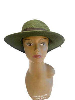 Vintage green fedora hat with feathers