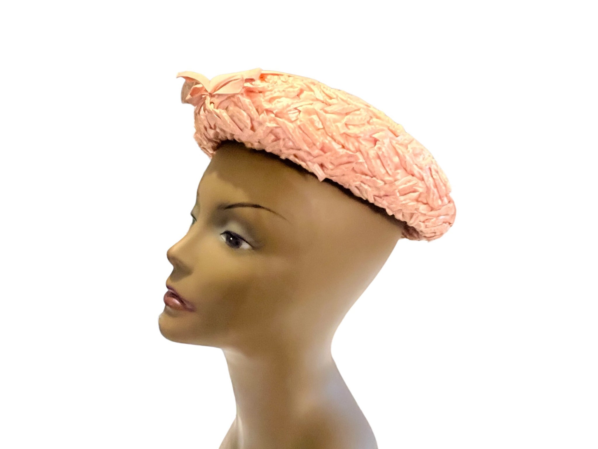 Vintage 60's pink hat with bow decor on front